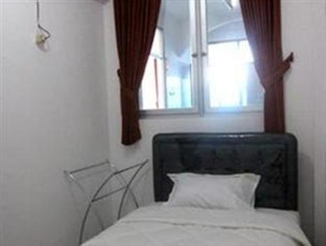 סוראבאיה Providence Homestay חדר תמונה